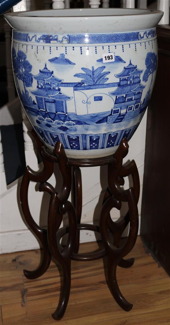 A Chinese blue and white jardiniere, on stand